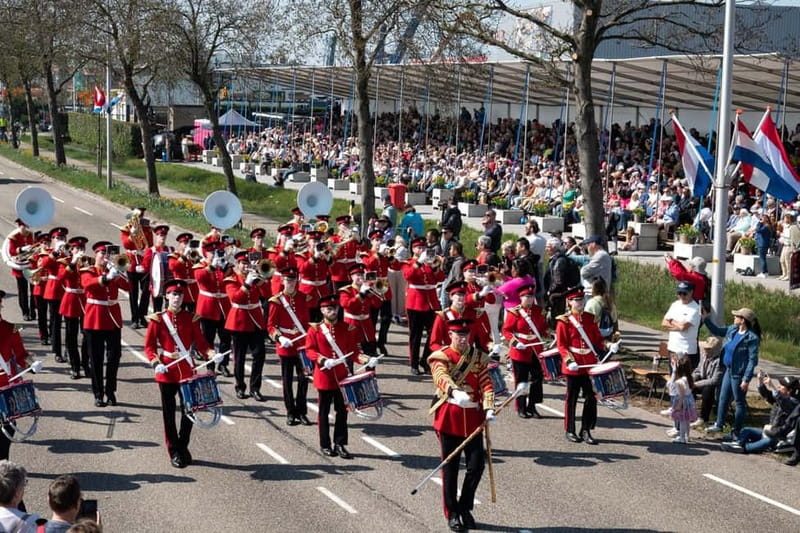Amsterdam: Day Trip to Flower Parade & Keukenhof on April 18 - Seeing the parade from a grandstand