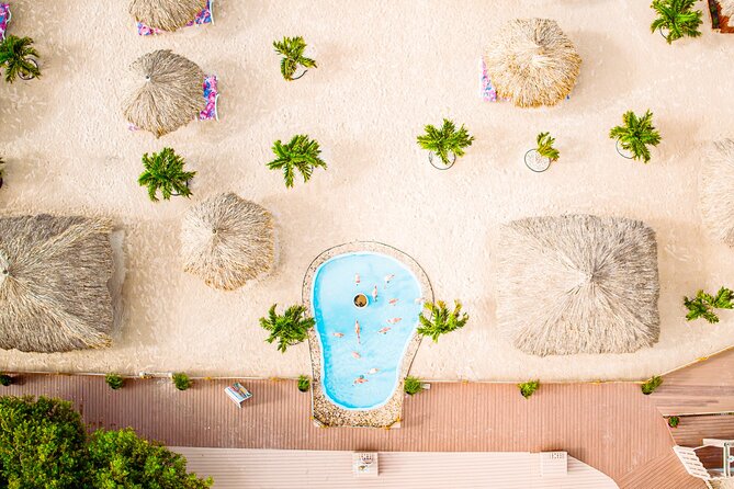 Aruba De Palm Island All-Inclusive Day Trip with Transport - Food, drinks, shade, and the daily rhythm