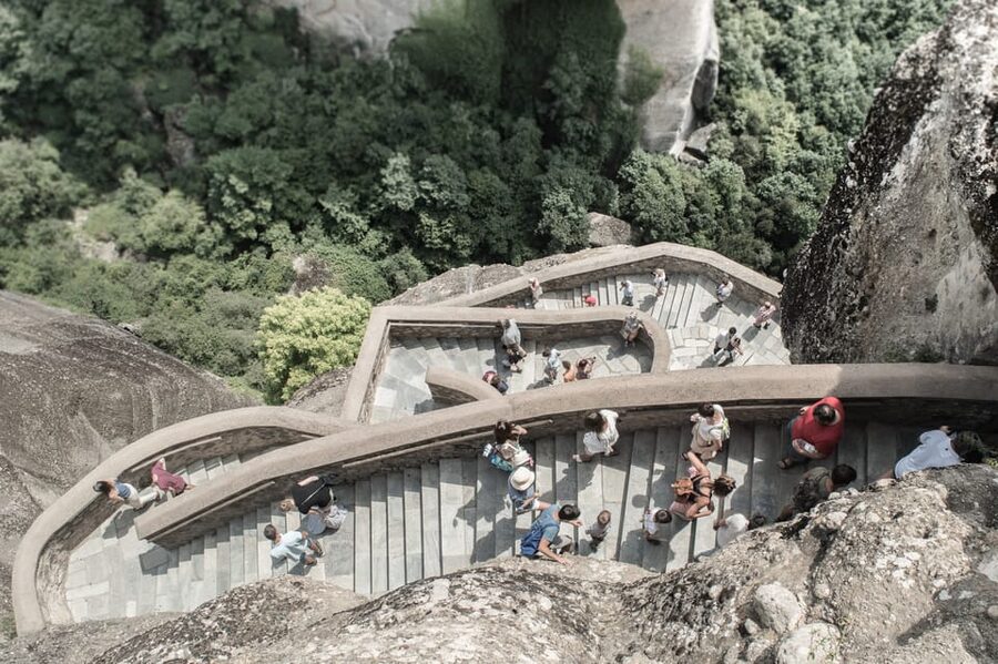 Athens: Meteora Day Trip with Central Pickup & Audio Guide - Kalabaka: lunch, a break, and the foot of the rocks