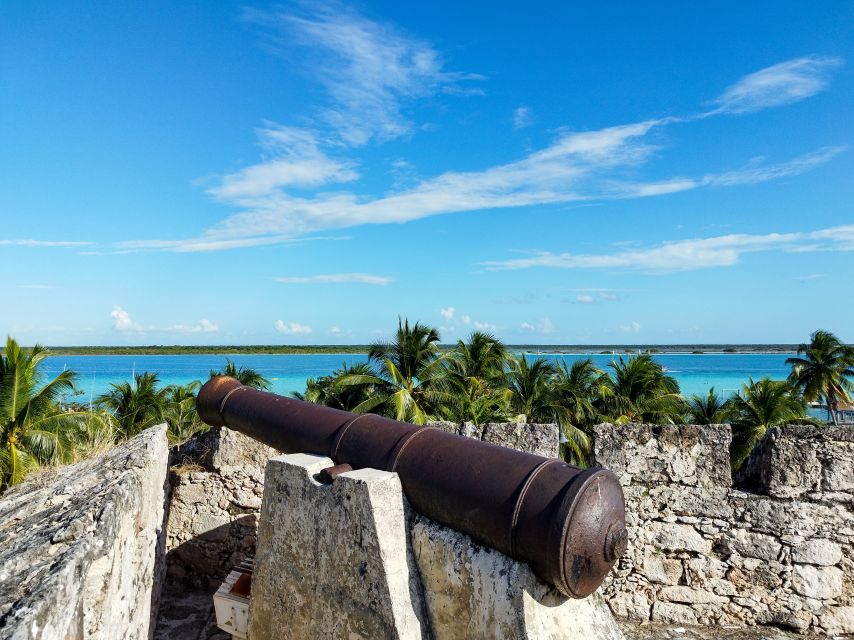 Bacalar: Lagoon, Pirate Canal, Stromatolite Day Trip w/Lunch - Cenote Negro and the darker center of the lagoon