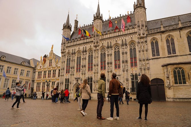 Bruges Guided or Audio Trip with Canal Cruise Option from Paris - Entering Bruges through the historic center