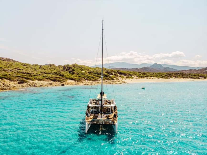 Catamaran half-day excursion - Bella Vita’s decks, bar, and swimming setup