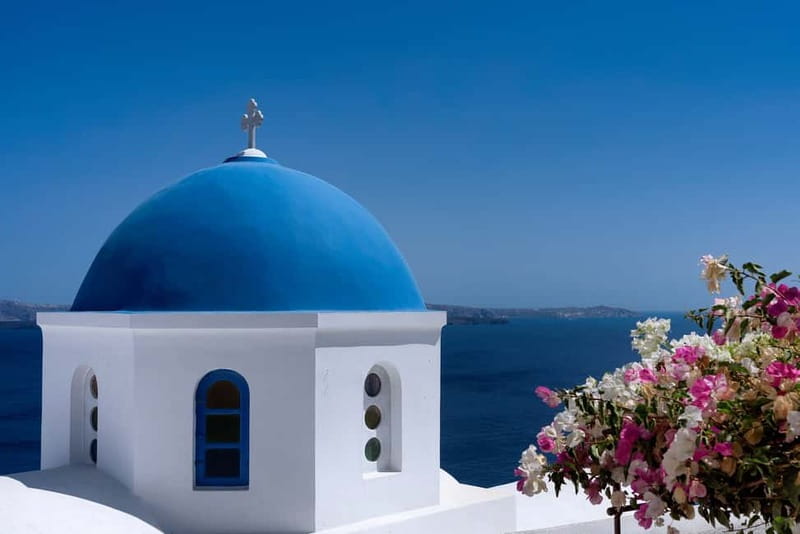 Crete: Santorini Day Trip with Fast Ferry Cruise - Fira: cliff views, food, and a different pace