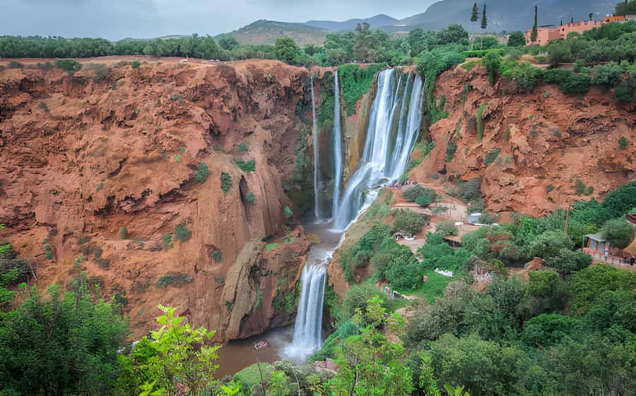 Day Trip To Ouzoud Waterfalls (Guide Hik & Boat option) - Walking beneath the falls with a local guide