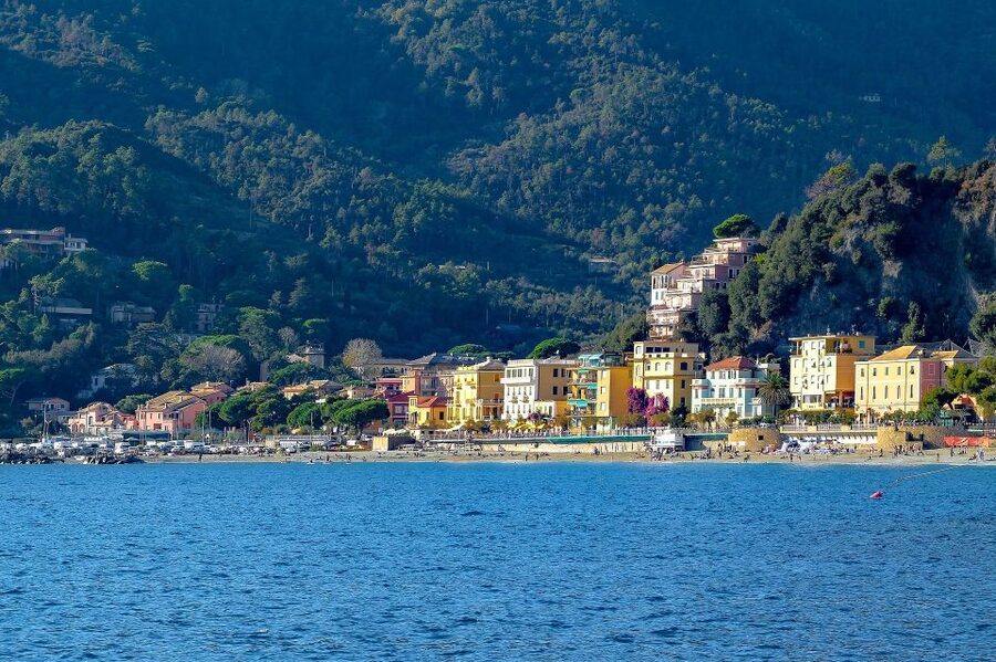 Florence: Cinque Terre Day Trip with Optional Street Food - Riomaggiore: steep lanes and colorful views
