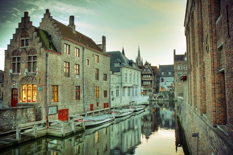 From Amsterdam: Day Trip to Bruges in Spanish or English - The coach ride through the Netherlands and Belgium