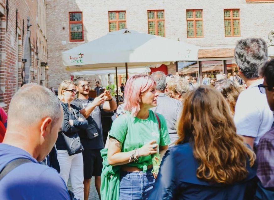 From Amsterdam: Day Trip to Bruges in Spanish or English - What the guides add to the day