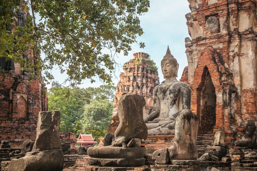 From Bangkok: Ayutthaya & Ayothaya Floating Market Day Trip - Wat Mahathat and the Buddha head in the tree