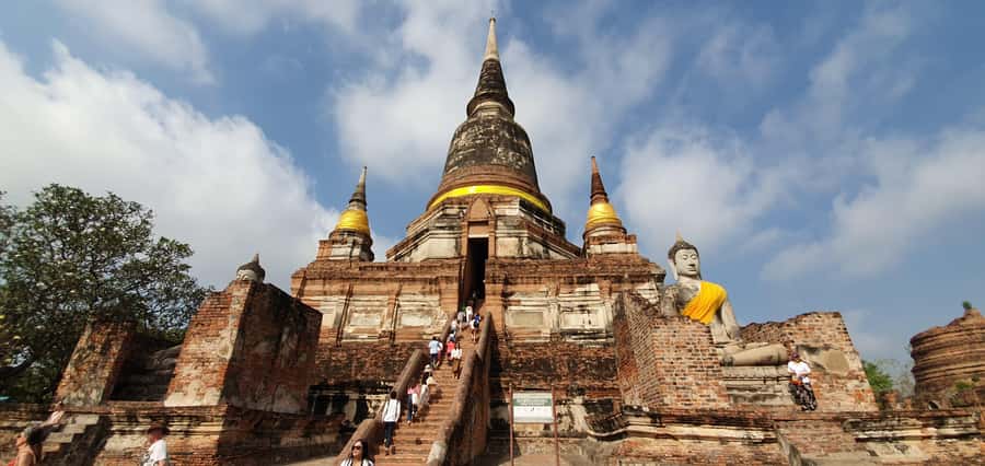 From Bangkok: Ayutthaya & Khao Yai National Park Day Trip - Ayutthaya begins with Wat Yai Chai Mongkhon