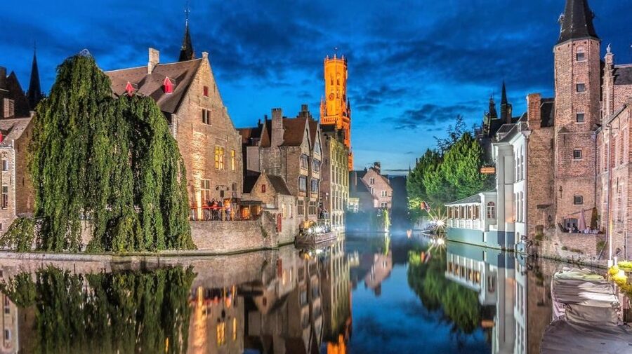 From Brussels: Bruges and Ghent Full-Day Trip by Train - Bruges begins with canals and quiet courtyards