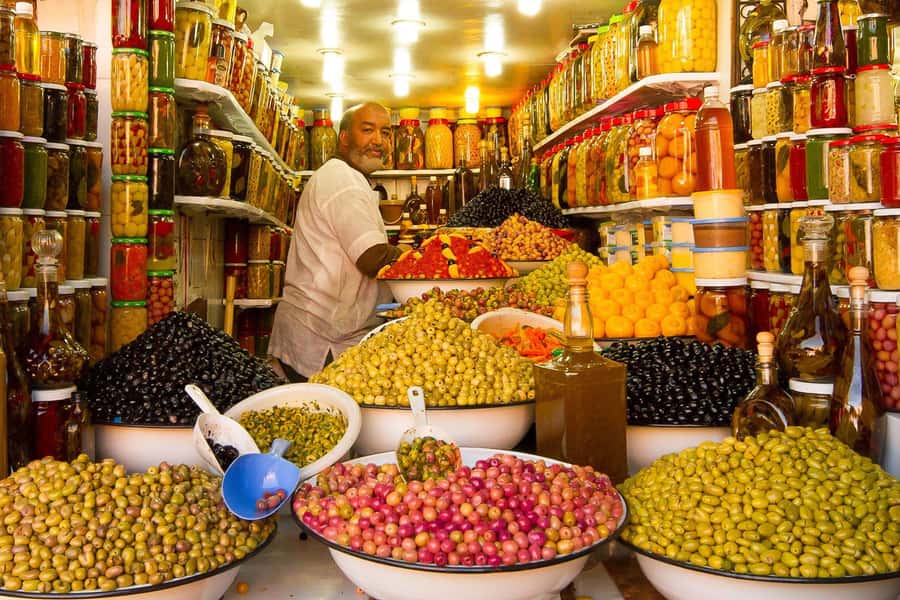 From Casablanca: Marrakech Guided Day Trip with Camel Ride - Bahia Palace: tilework, courtyards, and a separate entrance fee