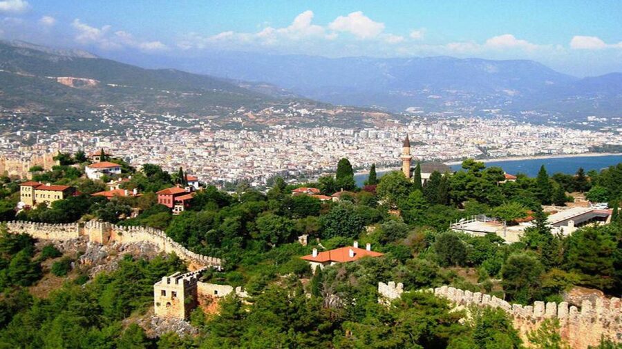 From city of Side: Guided Day Trip to Alanya City - The harbor boat and coastal perspective