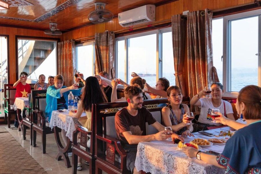 From Hanoi: Halong Bay Deluxe Cruise Day Trip - Surprise Cave: stairs, chambers, and a busy route