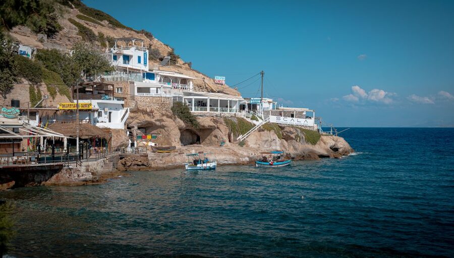 From Heraklion: Day Trip to Matala Hippie Beach and Caves - Walking the colorful town and eating by the sea