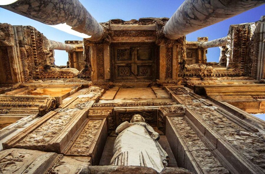From Izmir: Ephesus Guided Day Trip with Transfer & Lunch - Walking through the ancient city of Ephesus