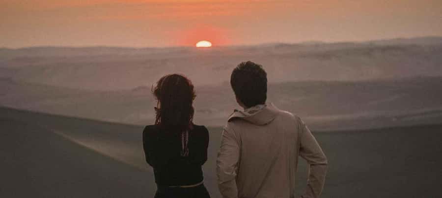 From Lima: Nazca Lines and Ica Desert Day Trip - Sunset over the dunes before the long ride home