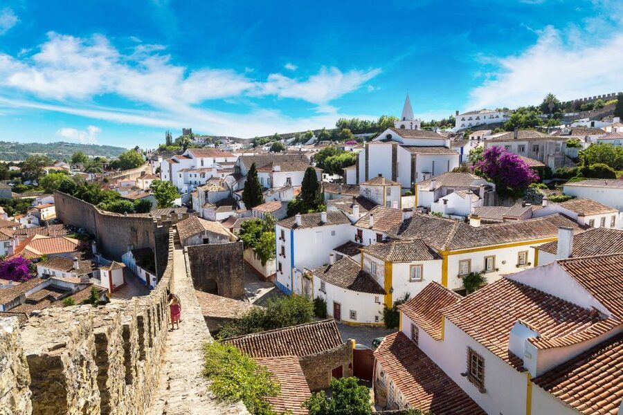 From Lisbon: Day Trip to Porto, Óbidos, and Nazaré - Óbidos, 45 minutes inside medieval walls