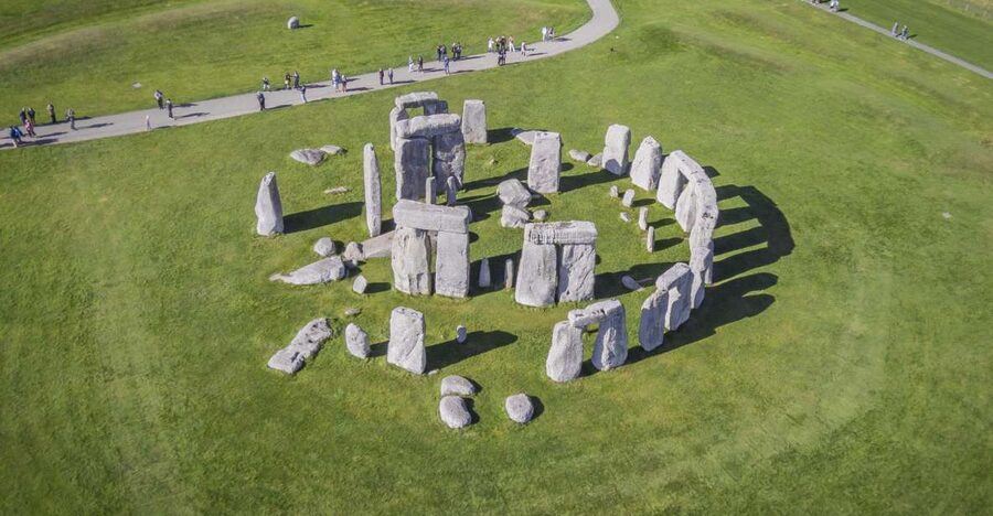 From London: Windsor Castle and Stonehenge Day Trip - Coach travel, meeting points, and timing