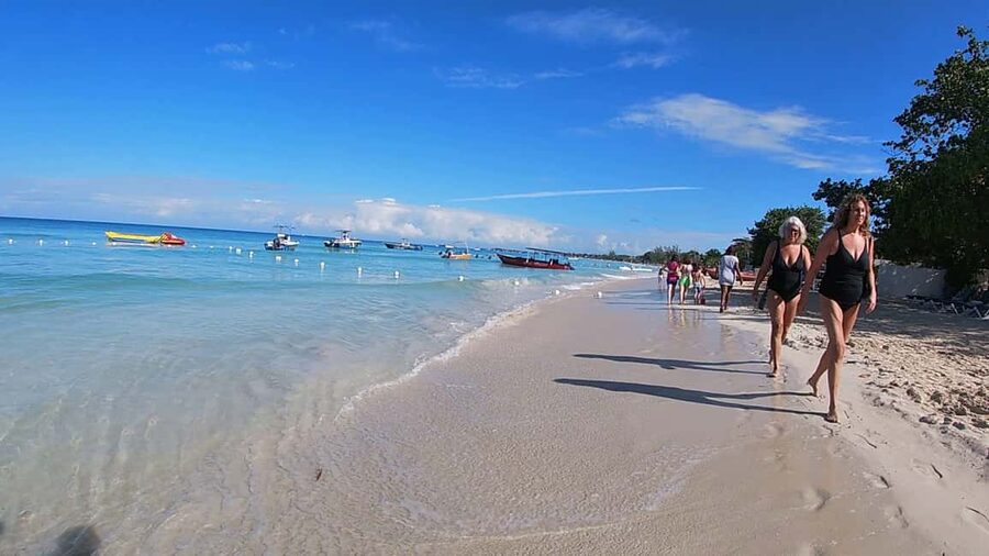 From Montego Bay: Negril Beach & Rick's Cafe Sunset Day Trip - Margaritaville Gives the Beach Stop Some Structure