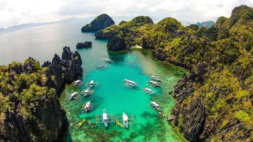 From Puerto Princesa: Day Trip to El Nido and Island Hopping - Reaching El Nido and boarding the boat