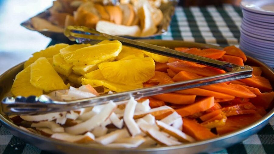 From Punta Cana: Samana Full Day Trip by Bus and Boat - Fruit, a local home, and the road to El Limón