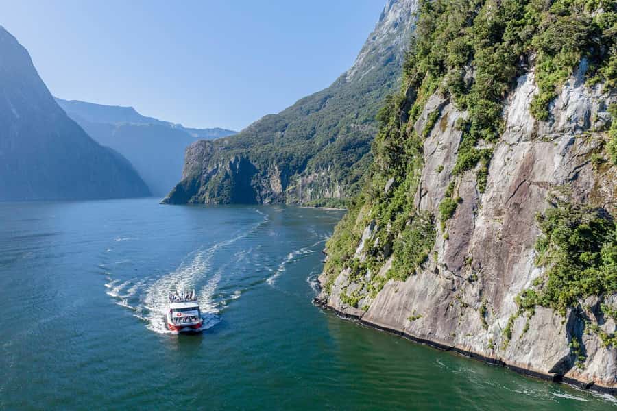 From Queenstown: Milford Sound Day Trip on Premium Coach - Boarding the two-hour Milford Sound cruise