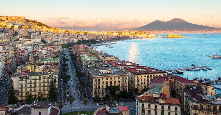 From Rome: Pompeii and Naples Day Trip by High-Speed Train - Entering Pompeii beneath Mount Vesuvius