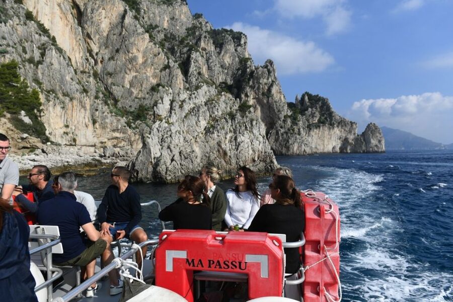 From Sorrento: Day Trip to Capri with Blue Grotto - Capri’s coast from the water