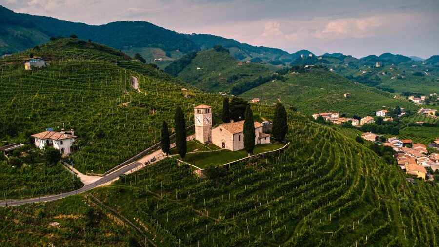 From Venice: Dolomites and Prosecco Hills Day Trip with Wine - The first mountain views: Santa Croce Lake and Alpago