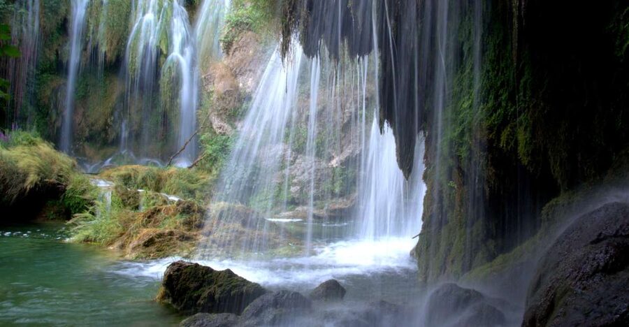 From Zadar: Krka National Park and Waterfalls Day Trip - Walking through Skradinski Buk
