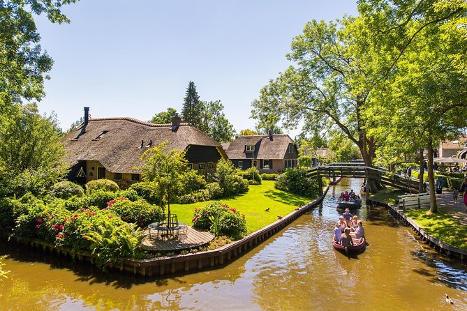 Giethoorn Day Trip from Amsterdam with Boat Trip - What the guide adds, and where the tour can fall short