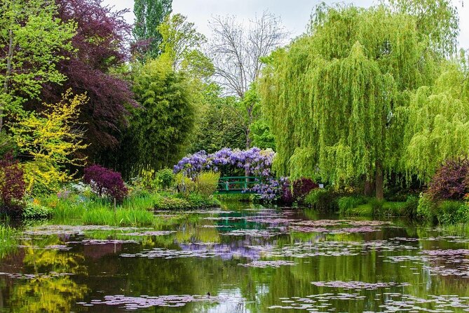 Giverny Small-Group Half Day Trip with Monet’s Gardens from Paris - Entering the Clos Normand flower garden
