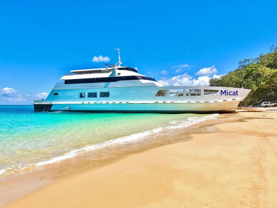 Gold Coast: Moreton Island Day Trip Kayak & Sandboarding - What to pack for water, sand, and the ride home