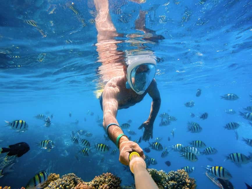 Hurghada: Orange Bay Day Trip with Water Sports and Lunch - Two snorkeling stops on Hurghada’s reefs