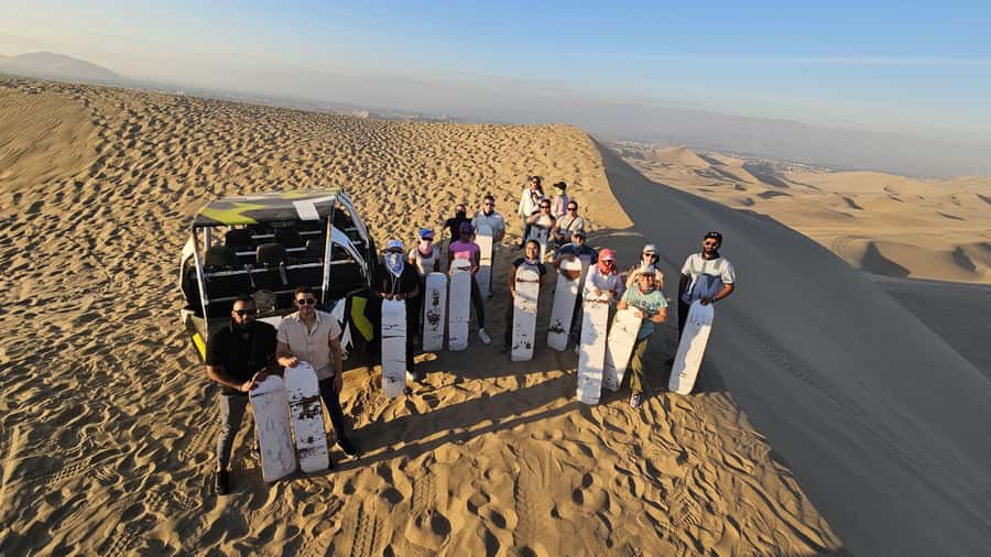 Lima: Paracas & Huacachina Oasis Day Trip with Wine & Dunes - The dune buggy ride and sandboarding