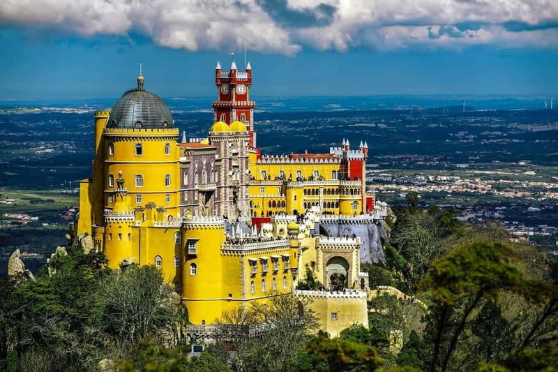 Magical Day Trip: Pena Palace, Sintra, CaboDa Roca & Cascais - Sintra center and the town between the monuments