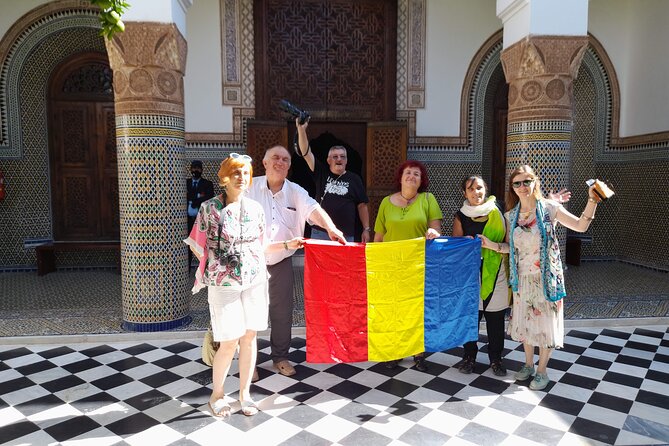 Marrakech day trip from Agadir & Taghazout - Arriving beneath the Koutoubia Mosque