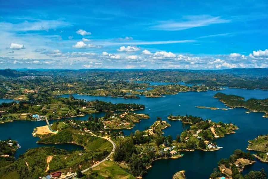 Medellin: Guatape and El Penol Rock Day Trip with Boat Ride - Guides, language, and group comfort