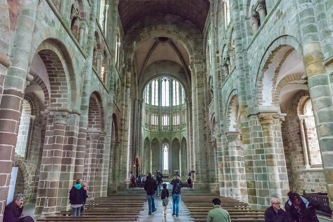Mont Saint Michel Day Trip from Paris with English Speaking Guide - Entering Mont Saint Michel Abbey with the audio app