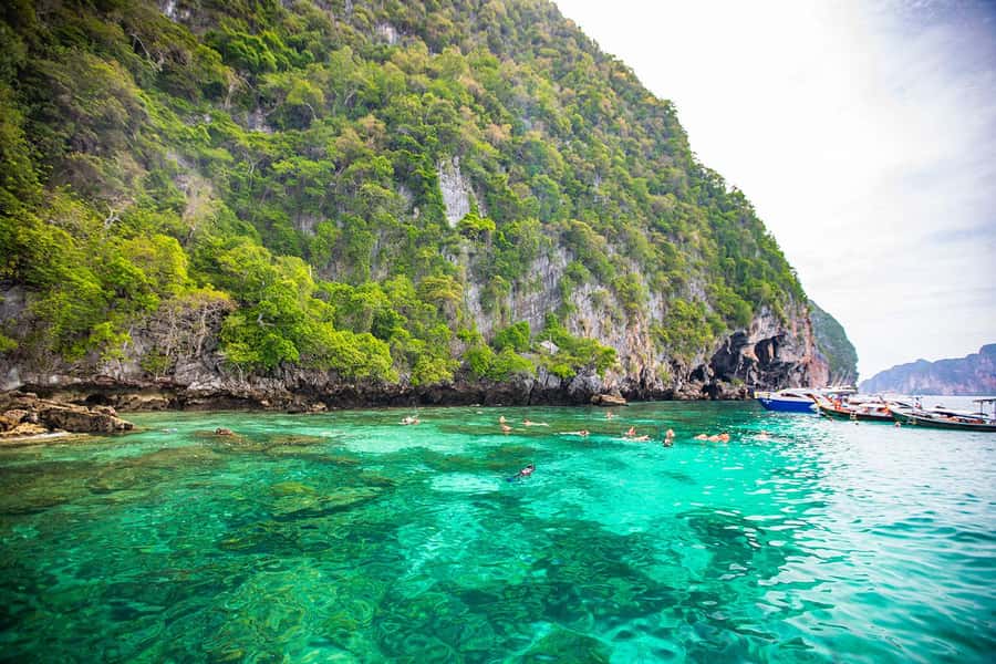 Phuket: Maya Bay, Phi Phi, Green, and Khai Islands Day Trip - Pickup from Phuket and the wait at AA Marina