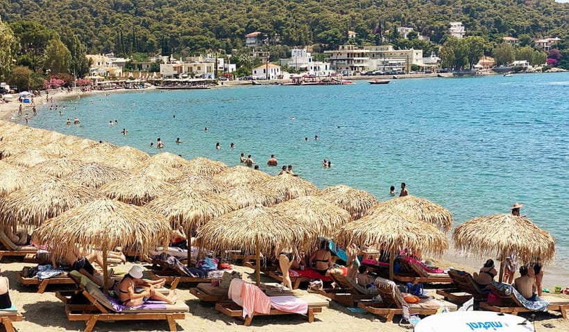 Poros Island: Full Day Trip From Athens with Swimming - Walking through Poros Town with the guide
