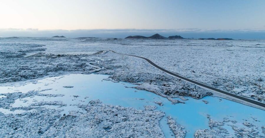 Reykjavik: Golden Circle Day Trip with Blue Lagoon Transfer - Kerid Crater’s red rock and bright water