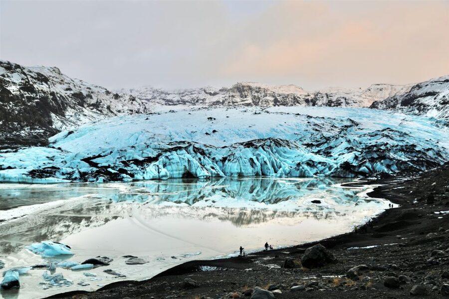 Reykjavík: South Coast Waterfalls, Black Sand & Glacier Tour - Seljalandsfoss lets you walk behind the water