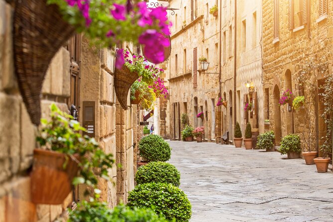 Rome: Tuscany & Montepulciano Day Trip with Lunch & Wine Tasting - Montepulciano, wine cellars, and hilltop views