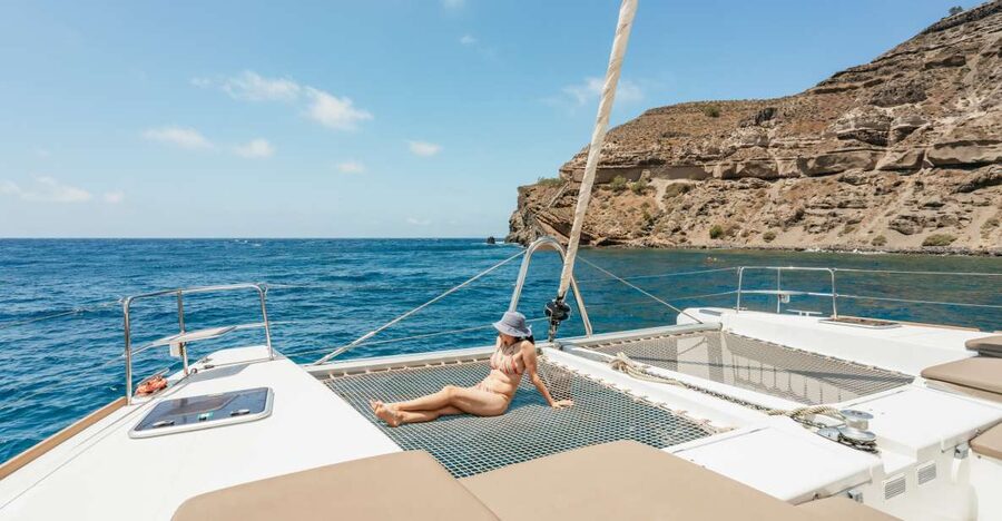Santorini: Luxury Catamaran Day Trip with Meal and Open Bar - Why seeing Santorini from a catamaran changes the day