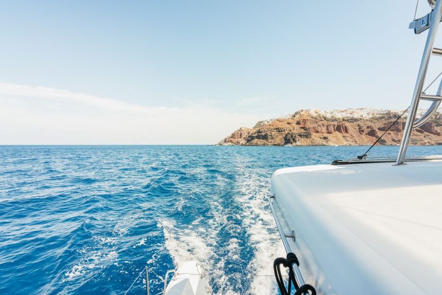 Santorini: Luxury Catamaran Day Trip with Meal and Open Bar - The caldera views and the Oia sunset