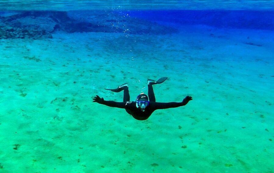 Silfra: Half-Day Snorkeling Day Trip with Underwater Photos - Cold water, warm clothes, and the drysuit choice