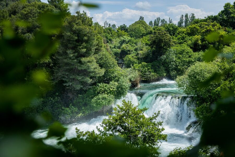 Split: Krka National Park Day Trip with Boat Ride & Swimming - Skradin Beach and the Town Stop