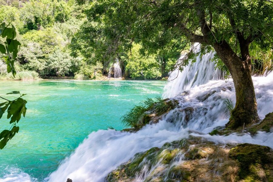 Split: Krka Waterfalls Guided Day Trip with Swim & Boat Tour - Walking through Krka’s waterfalls and woodland